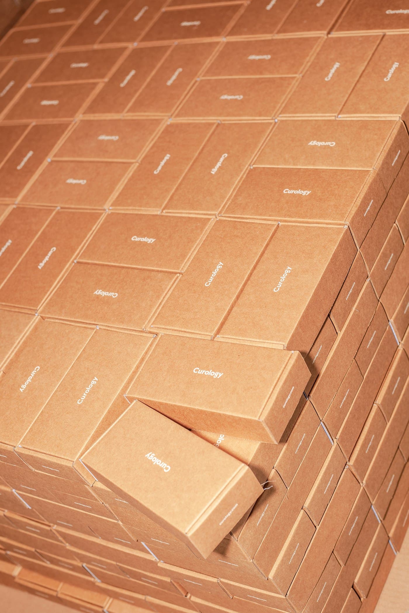 A labelled brown corrugated mailer box