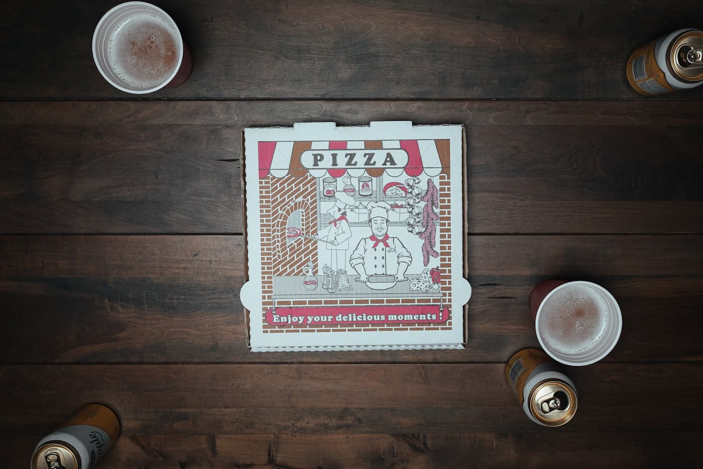 A pizza on a white corrugated pizza box