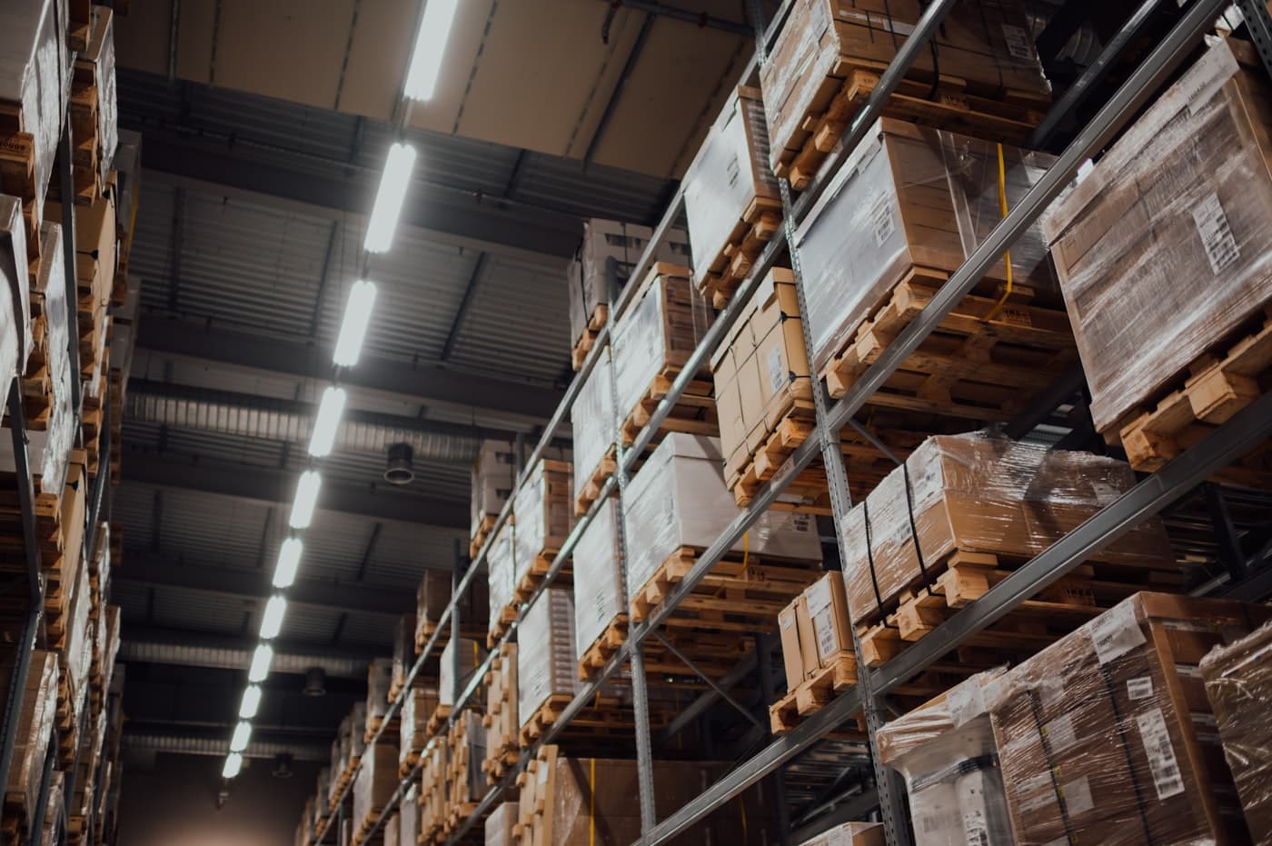 Brown corrugated shipping boxes arranged on a warehouse rack
