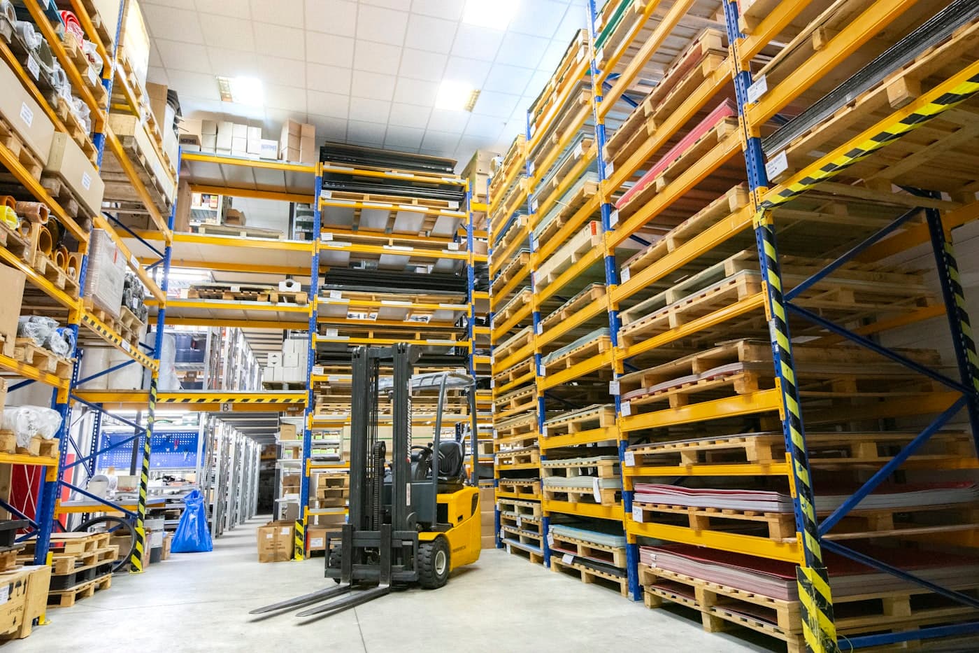 Corrugated storage cartons on warehouse pallet racking